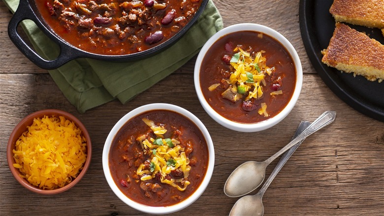 bowls of chili with cheese
