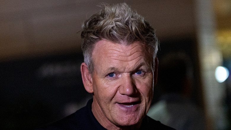 Gordon Ramsay's face in focus at an F1 event