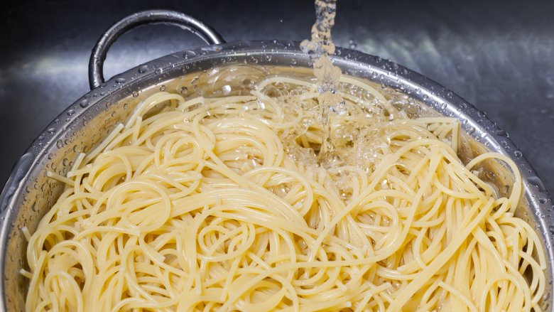 draining spaghetti