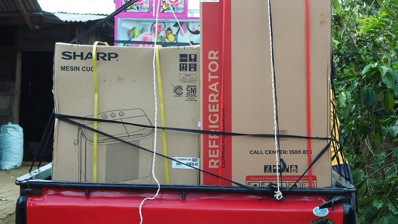 Refrigerator in back of truck