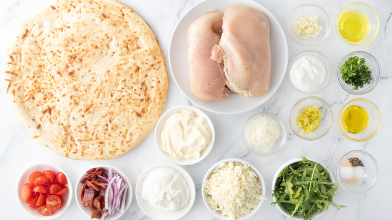 Ingredients for chicken bacon ranch pizza