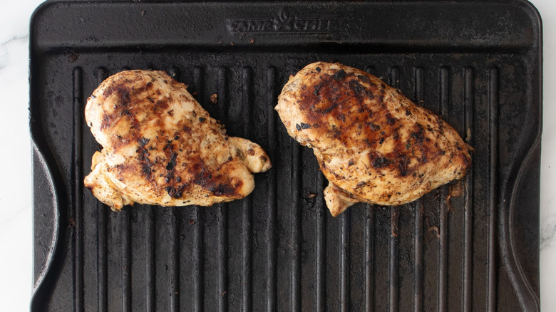 Grilled chicken breasts on grill pan