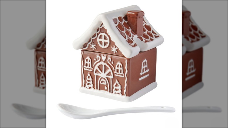 Sugar bowl shaped like ginger bread house with spoon