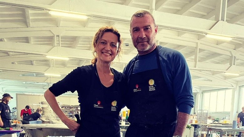 Liev Schreiber standing over a pot of borscht