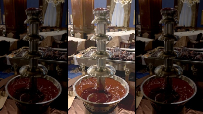 meat dipped in barbecue sauce fountain