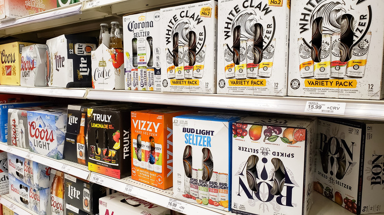 Various brands of hard seltzer on grocery store shelves