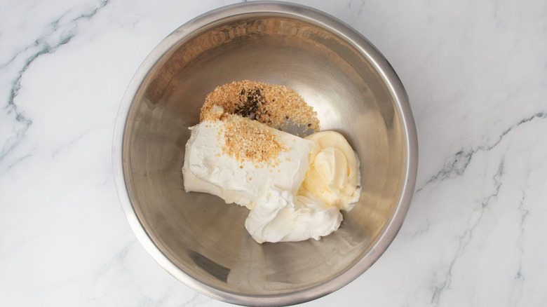 Cream cheese, mayonnaise, and seasonings in bowl