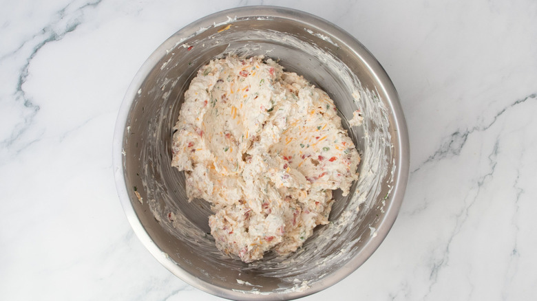 Pimento chicken bacon ranch dip mixed in bowl
