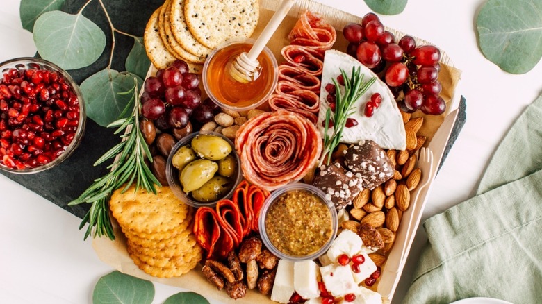 Charcuterie board with meat flower
