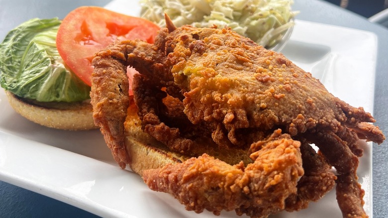 Fried crab on bun with lettuce and tomato