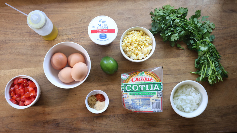 Elote breakfast scramble ingredients laid out on countertop