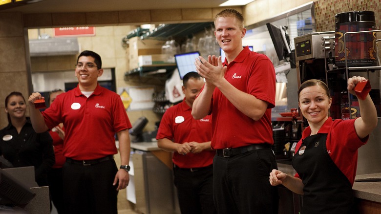Workers at a Chick-fil-A restaurant