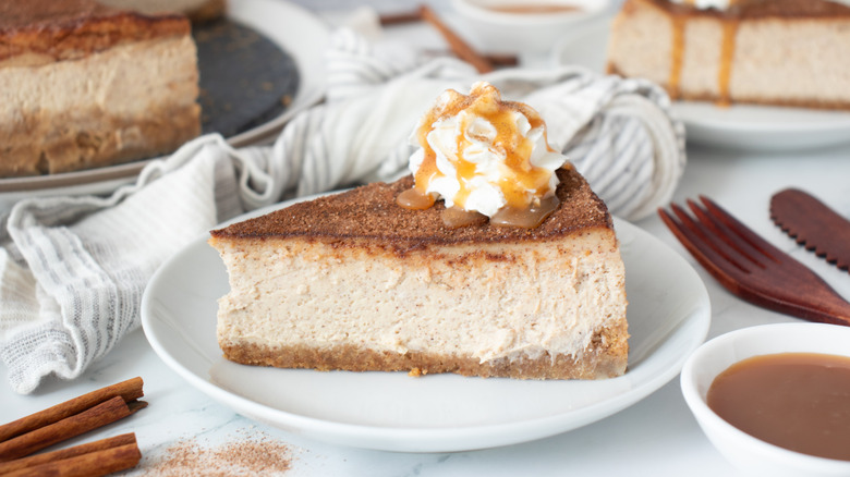 Slice of spiced snickerdoodle cheesecake on plate