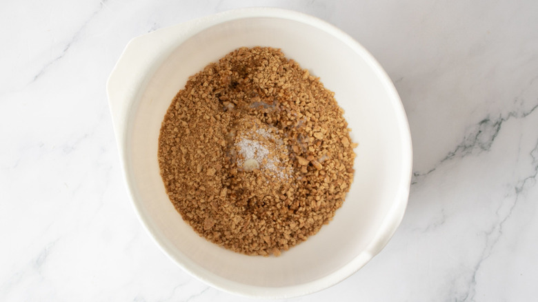 Crushed graham crackers in bowl