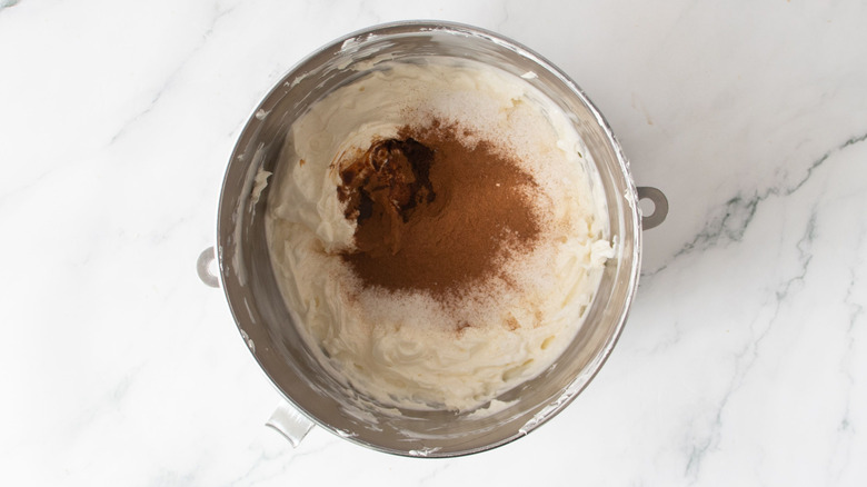 Cream cheese mixture and cinnamon in bowl