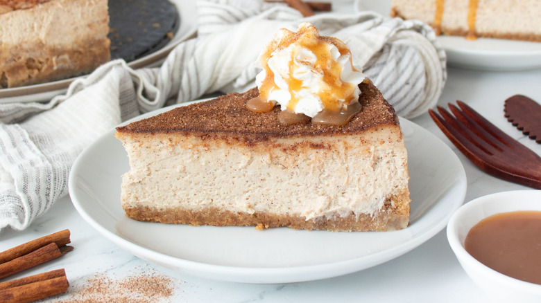 Slice of snickerdoodle cheesecake on plate