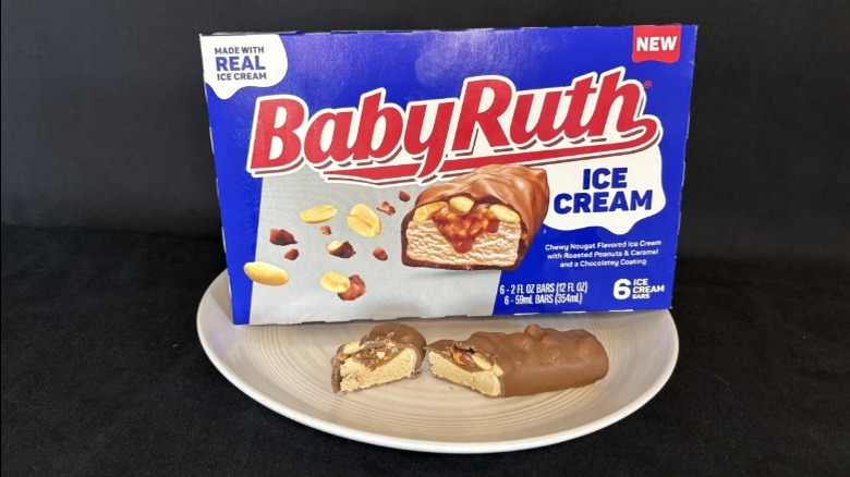 Box of Baby Ruth ice cream bars with single unwrapped bar on plate.