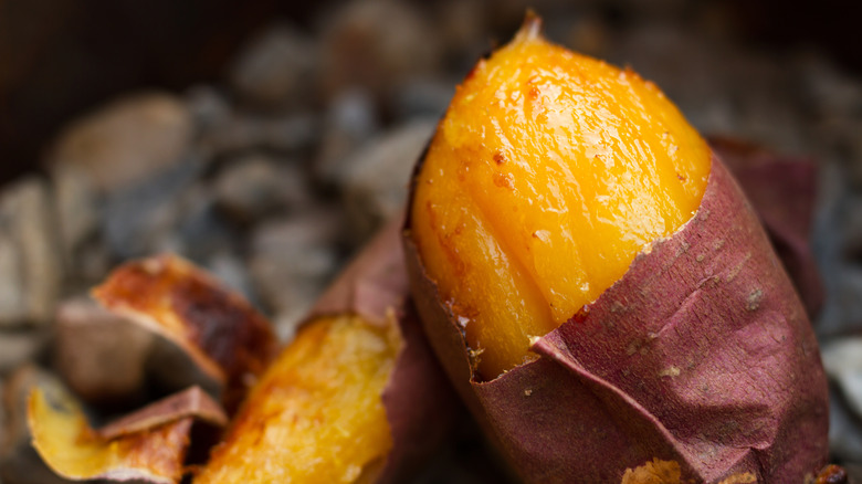 baked, partially peeled sweet potato