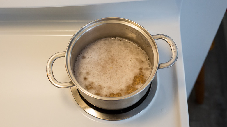 farro cooking in medium pot