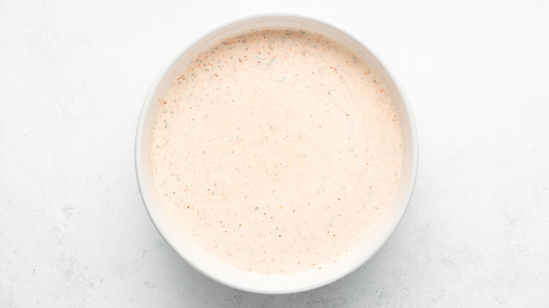 Copycat Popeyes blackened ranch sauce in white bowl