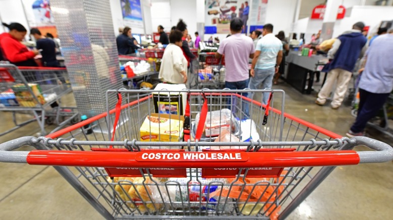 Costco checkout line with foreground image of cart
