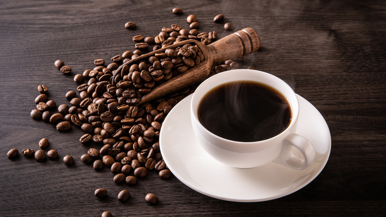 Mug of coffee and beans