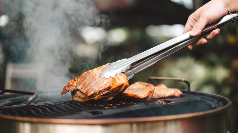 Grilling meat outside