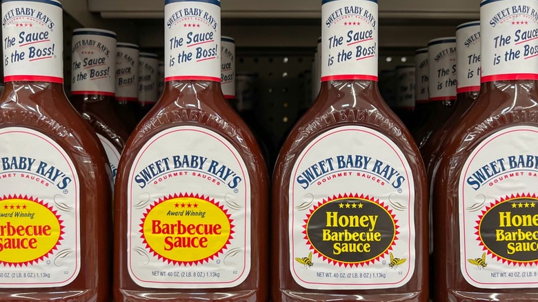 Sweet Baby Ray's sauce bottles on grocery store shelf