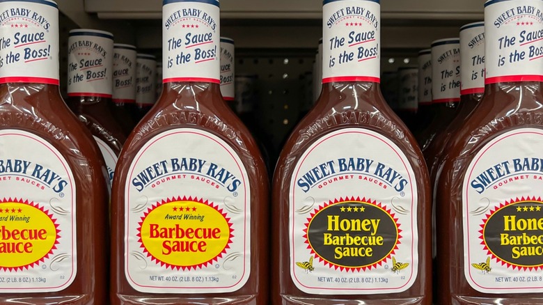 Sweet Baby Ray's sauce bottles on grocery store shelf