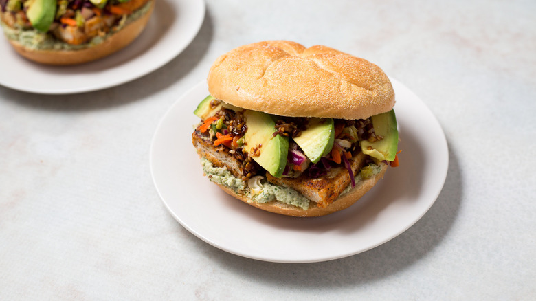 loaded tofu sandwiches on table