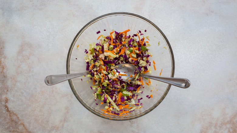 cabbage slaw in mixing bowl