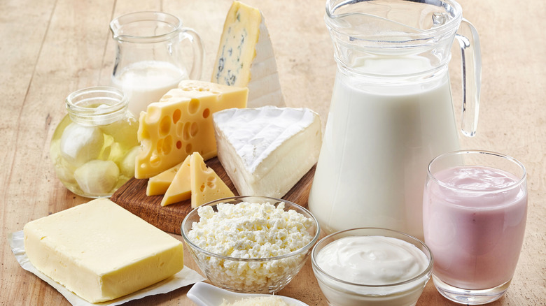 various dairy products on wood table