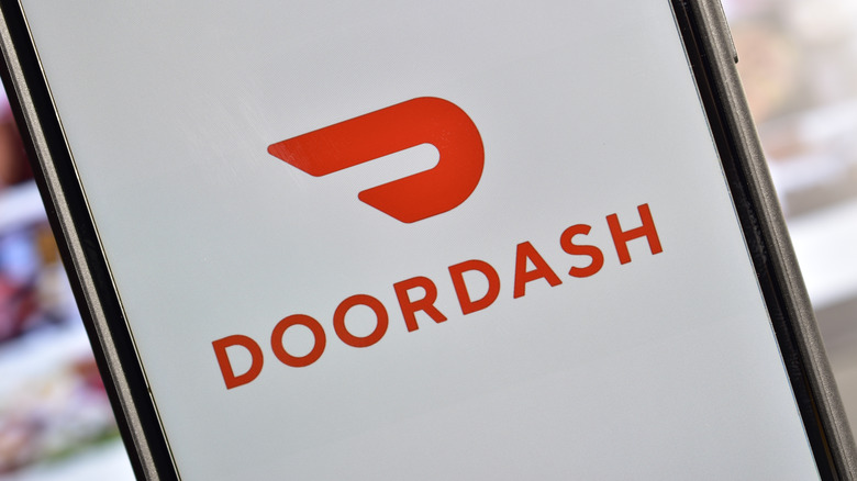 DoorDash logo on phone