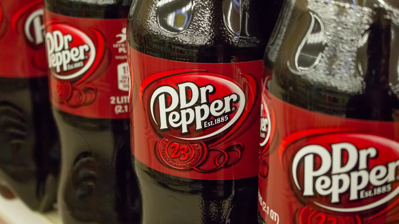 The Dr Pepper logo seen on soda bottles
