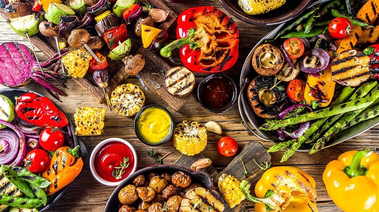 Mixed grilled vegetables on a wooden table 