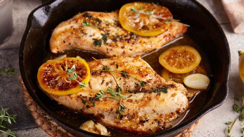 baked chicken in a cast iron skillet