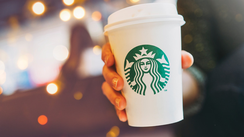 White Starbucks cup with a logo