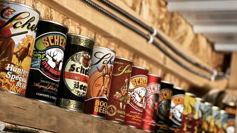 Row of vintage Schell beer cans
