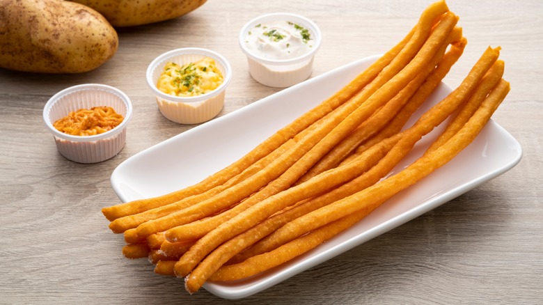 Japanese long fries with three sauces on side