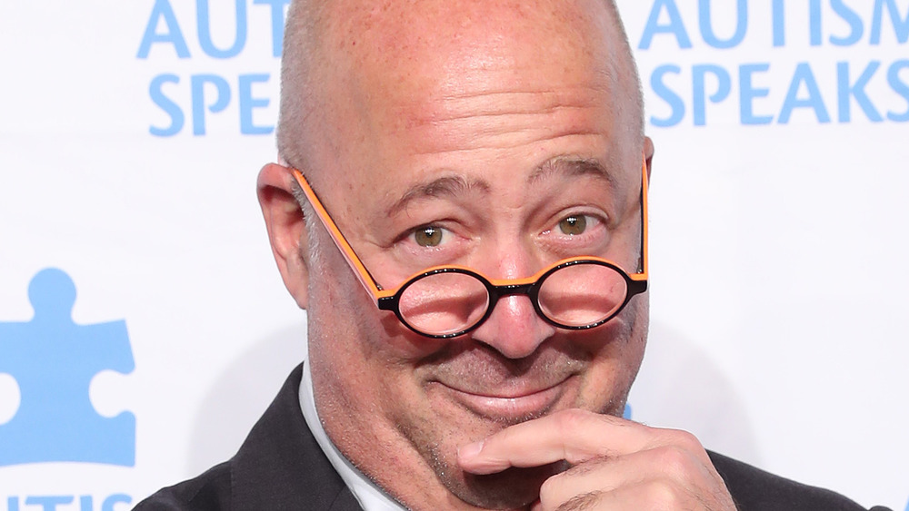 Andrew Zimmern touching chin