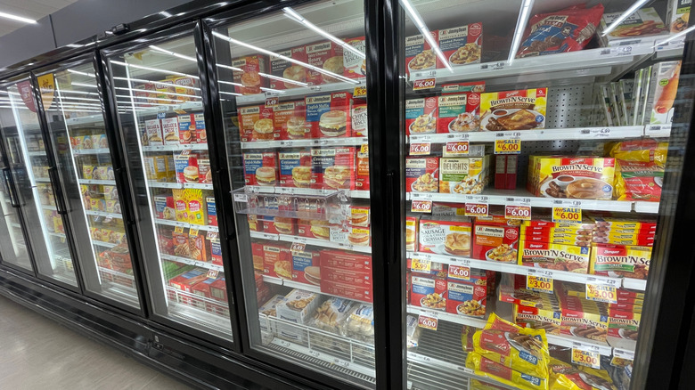 Supermarket freezer case with breakfast items