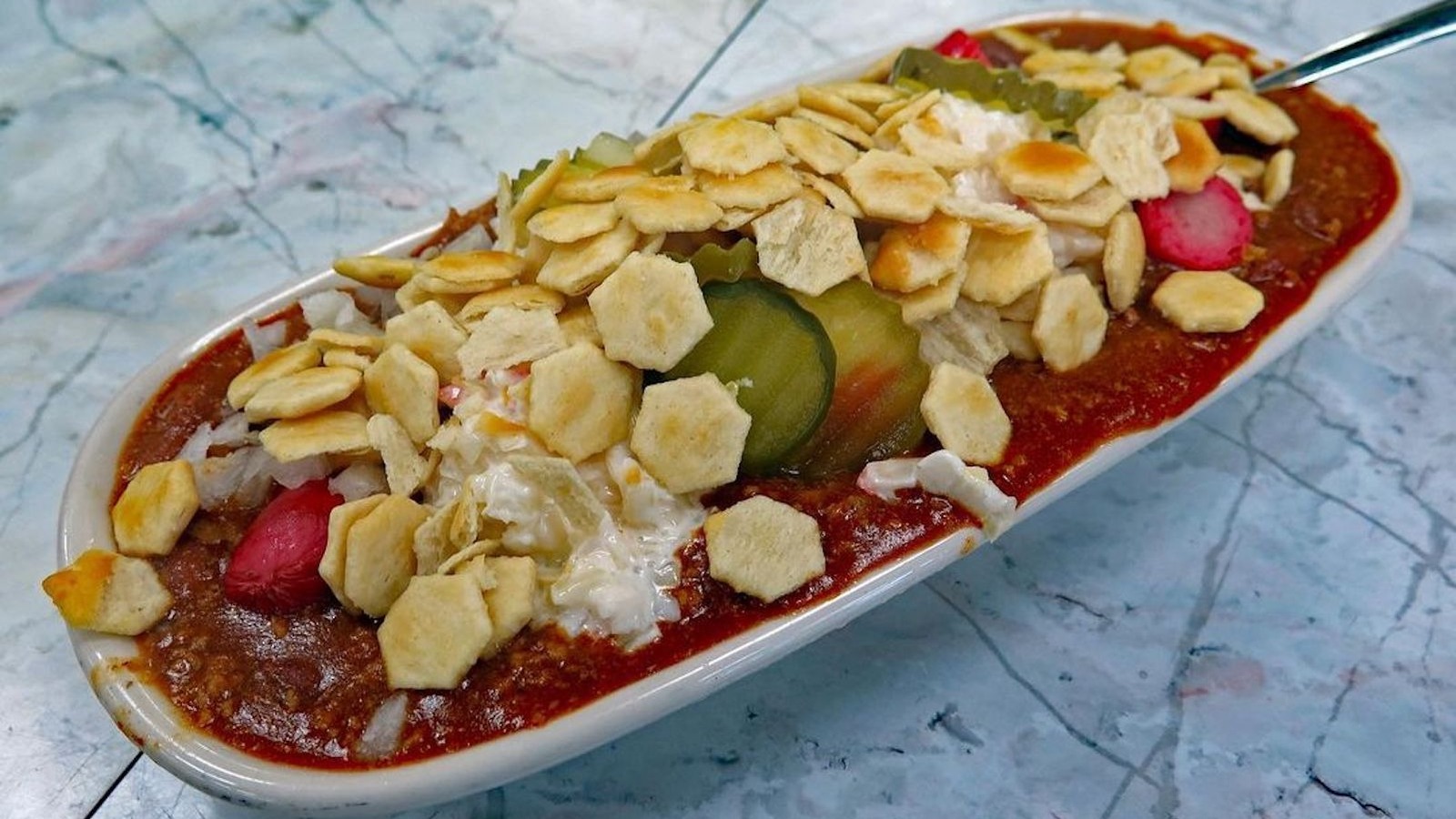 This Hot Dog Is So Messy Some People Eat It With A Spoon