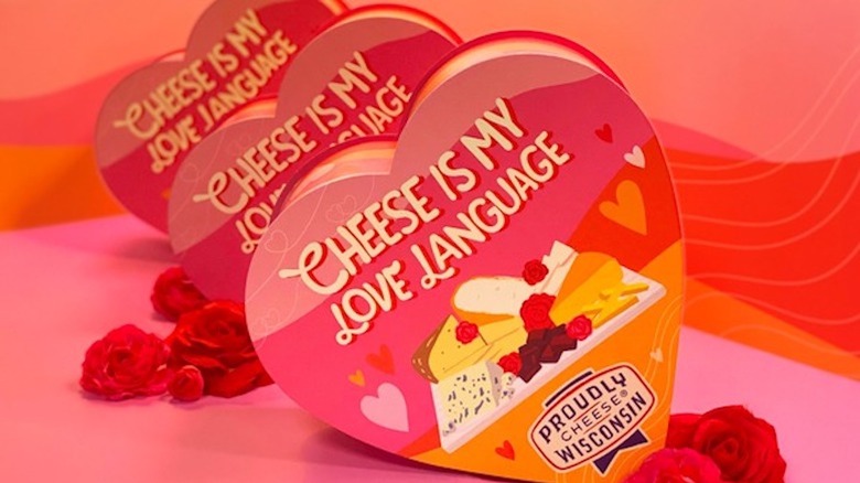 Heart-shaped box reading "cheese is my love language"