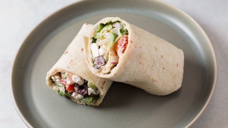 Greek salad wrap on plate