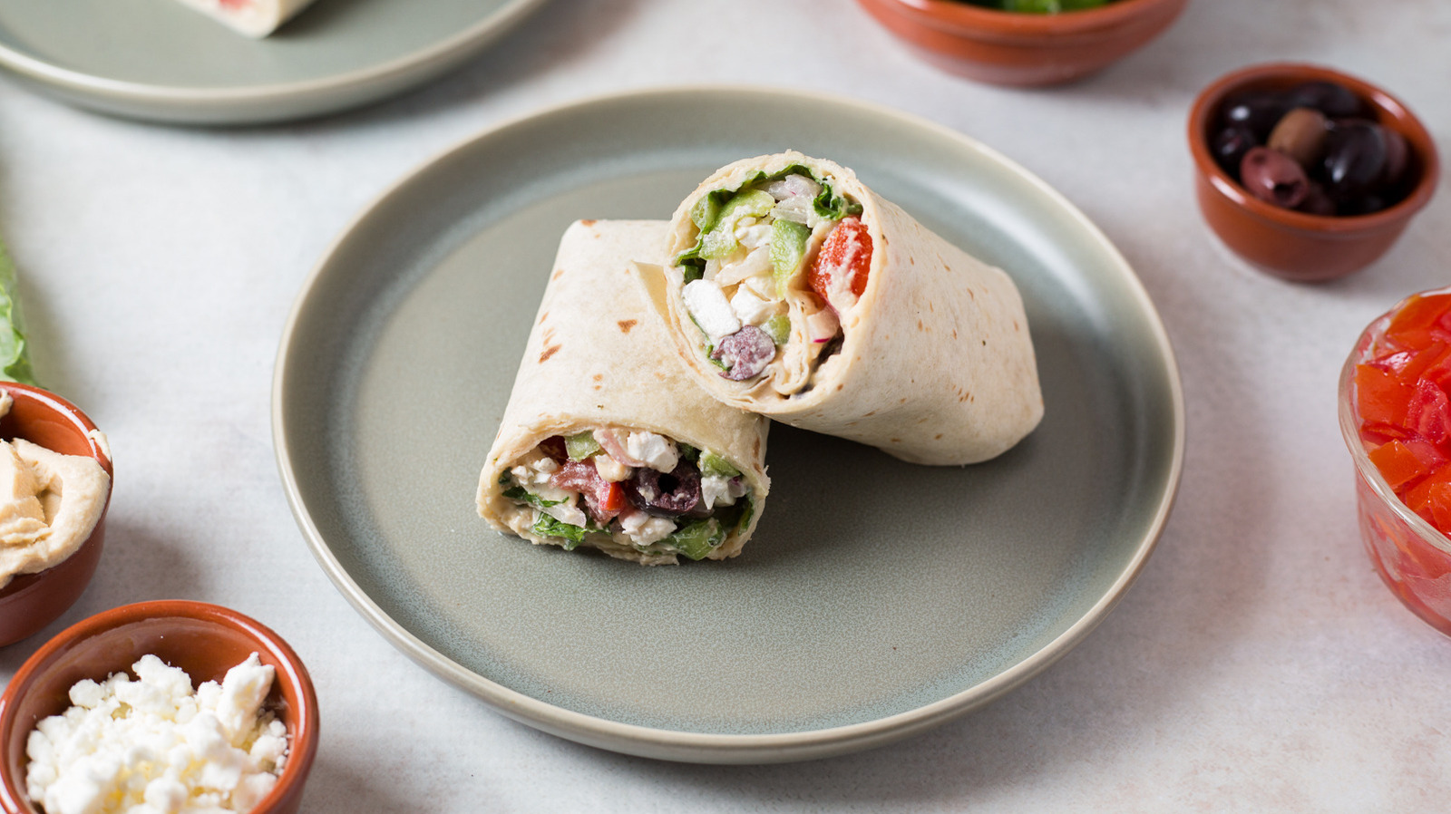 This Greek Salad Wrap Recipe Is Fresh, Filling, And Ready In 10 Minutes
