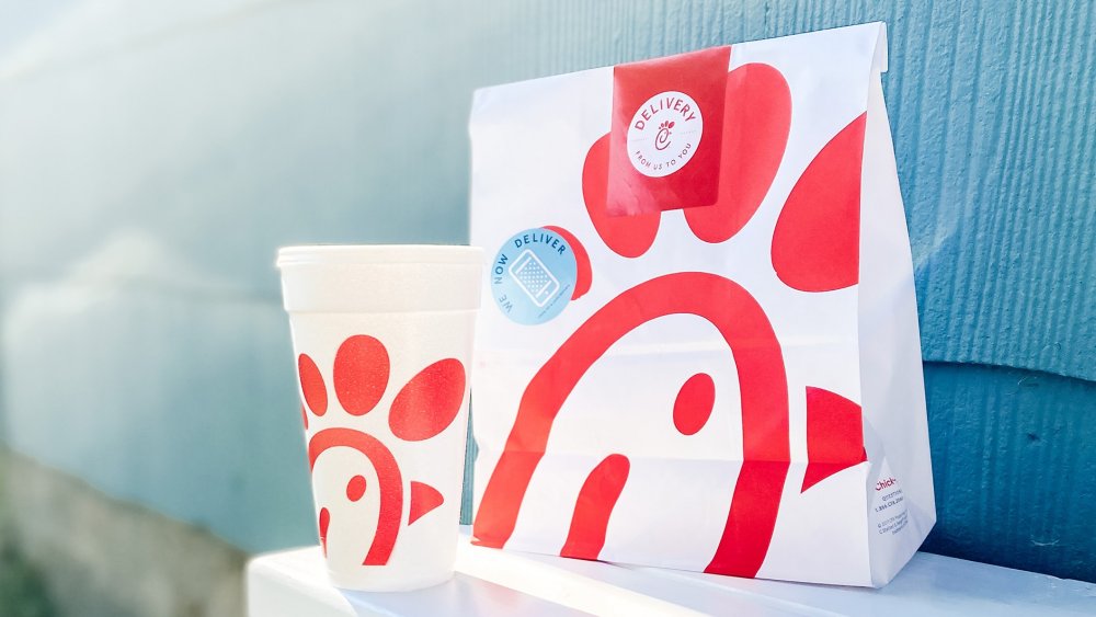 Chick-fil-A takeout bags and soda cup