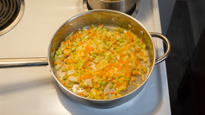 vegetables cooking in large pan