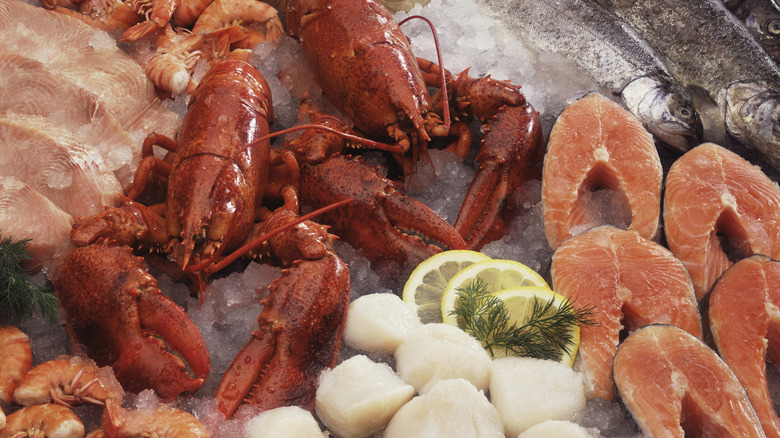 Fresh lobster, shrimp, and fish on ice