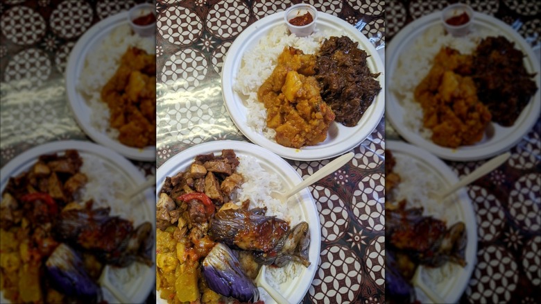 Two plates of Indonesian cuisine on table