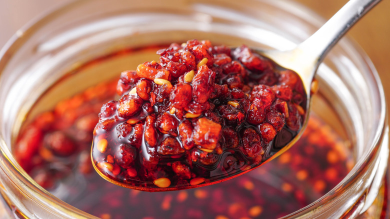 Chili oil in a spoon